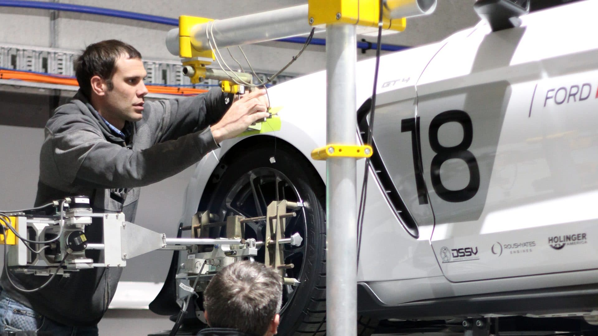 Kinematics and Compliance (K&C) rig