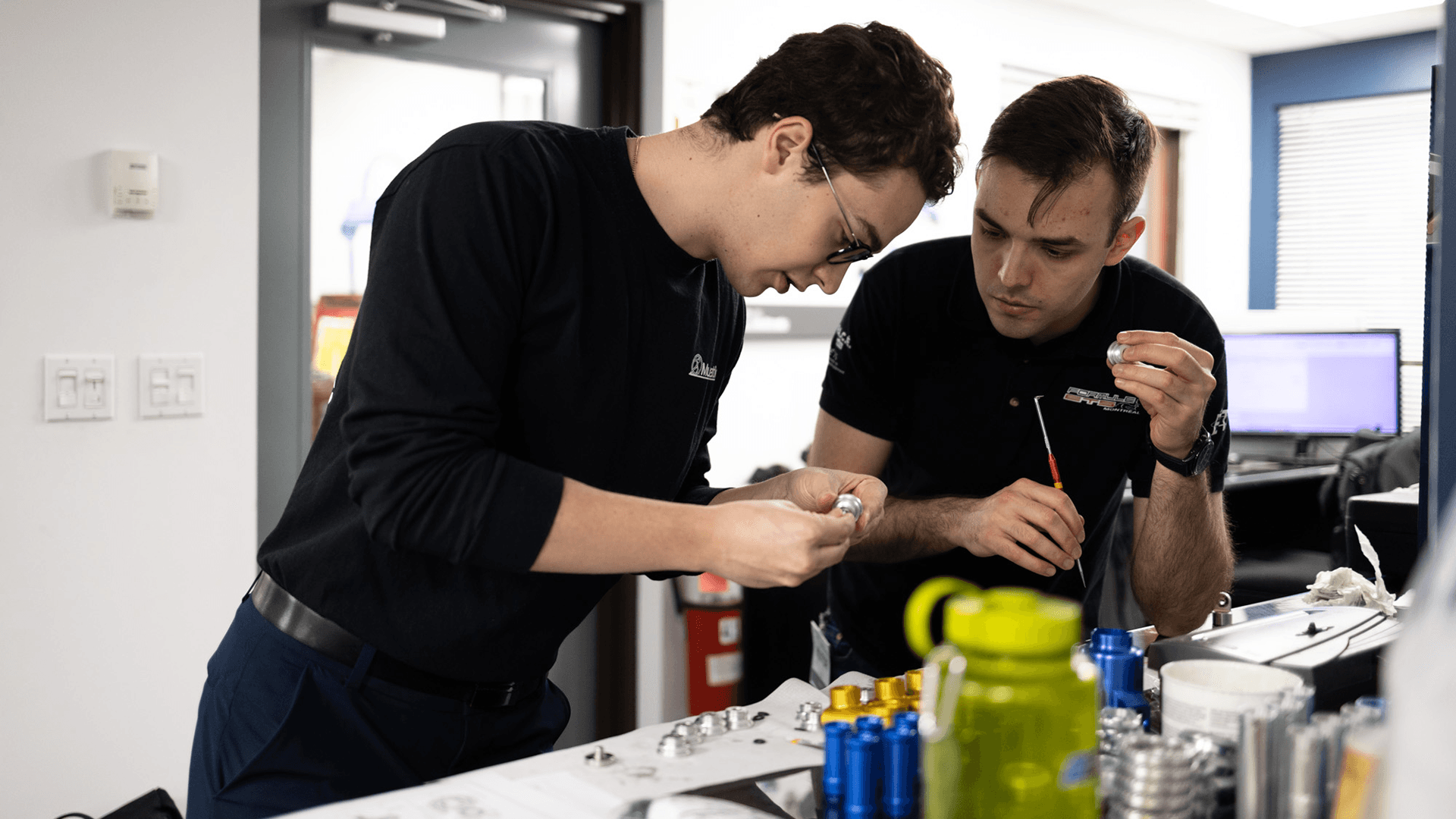 FSAE students working on damper.